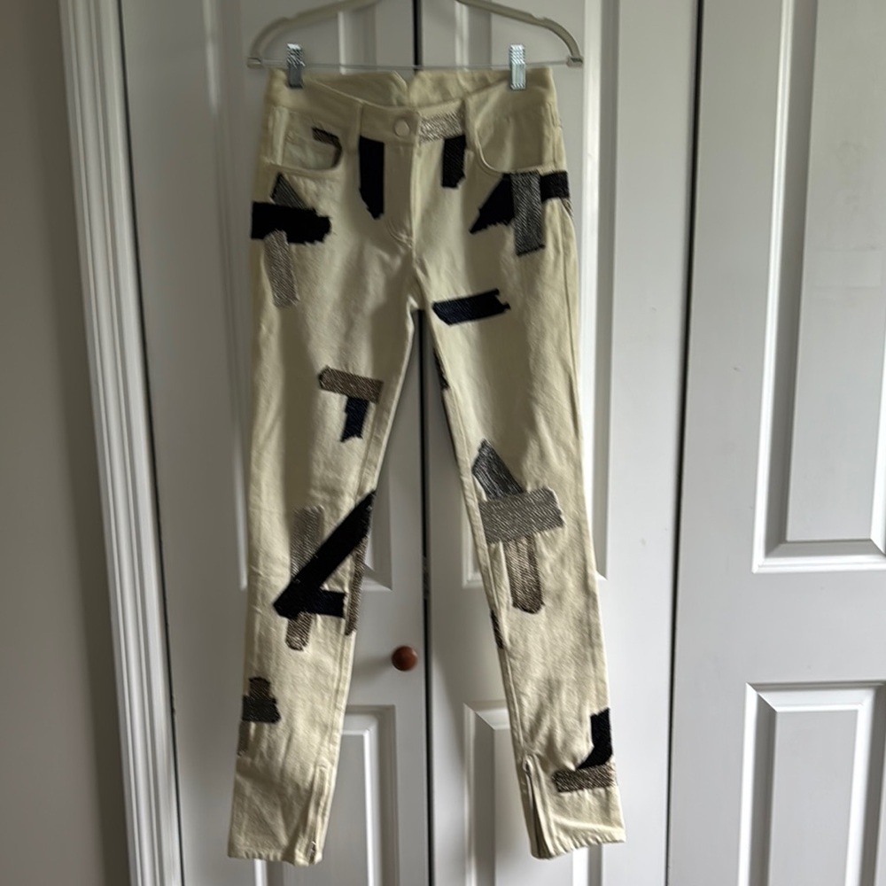 3.1 Phillip Lim Cream and Black Chinos with Artistic Design